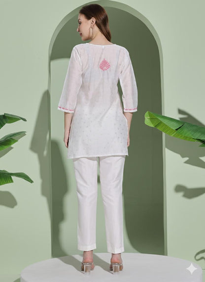 Women White Chanderi Hand Chikankari Short Kurta with pink embroidered detailing on neckline, sleeves.