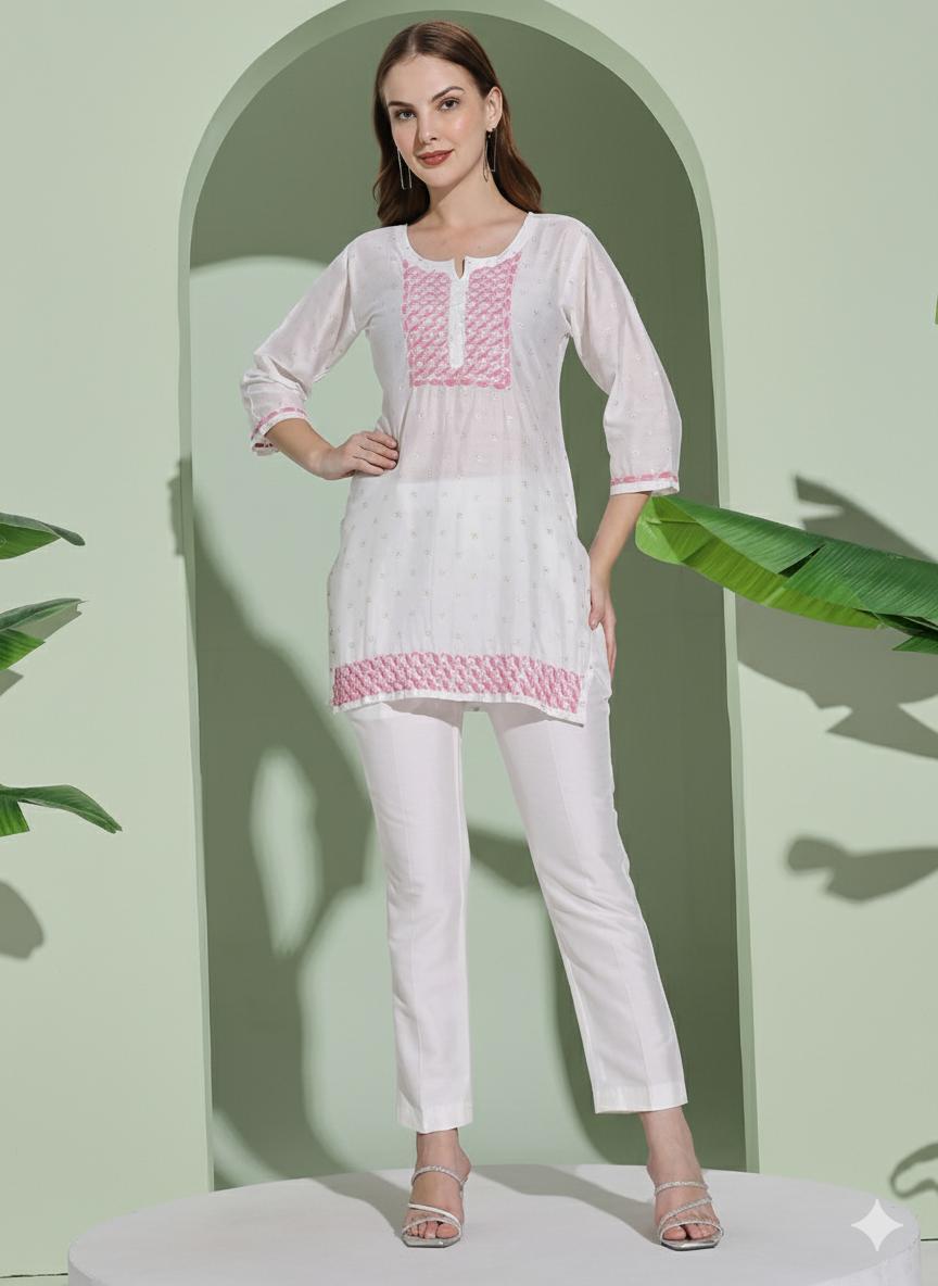 Women White Chanderi Hand Chikankari Short Kurta with pink embroidered detailing on neckline, sleeves.